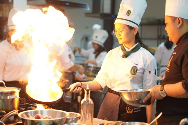 Cooking at OTTIMMO cooking with flame